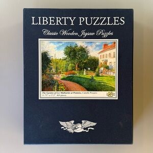 Liberty Puzzles The Garden of Les Mathurins at Pontoise by Camille Pissarro